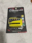 Security Wheel Disc Brake Lock Anti-theft Loud Alarm Touch Motorcycle Scooter. Fixed Price $27.99.
